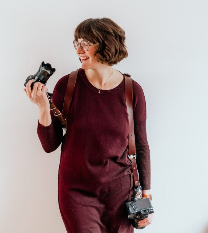 Girl Taking Photo Using a Camera